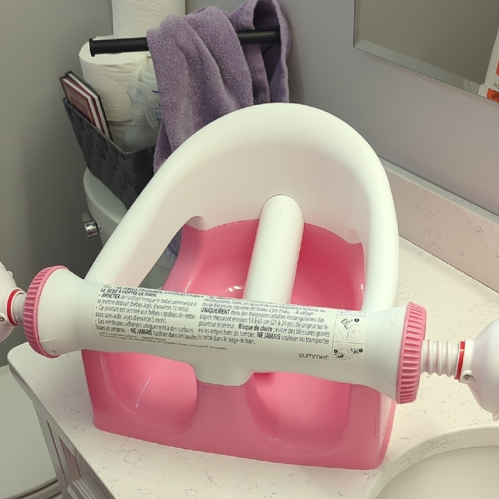 Pink and White Infant Bath Seat with Supportive Insert